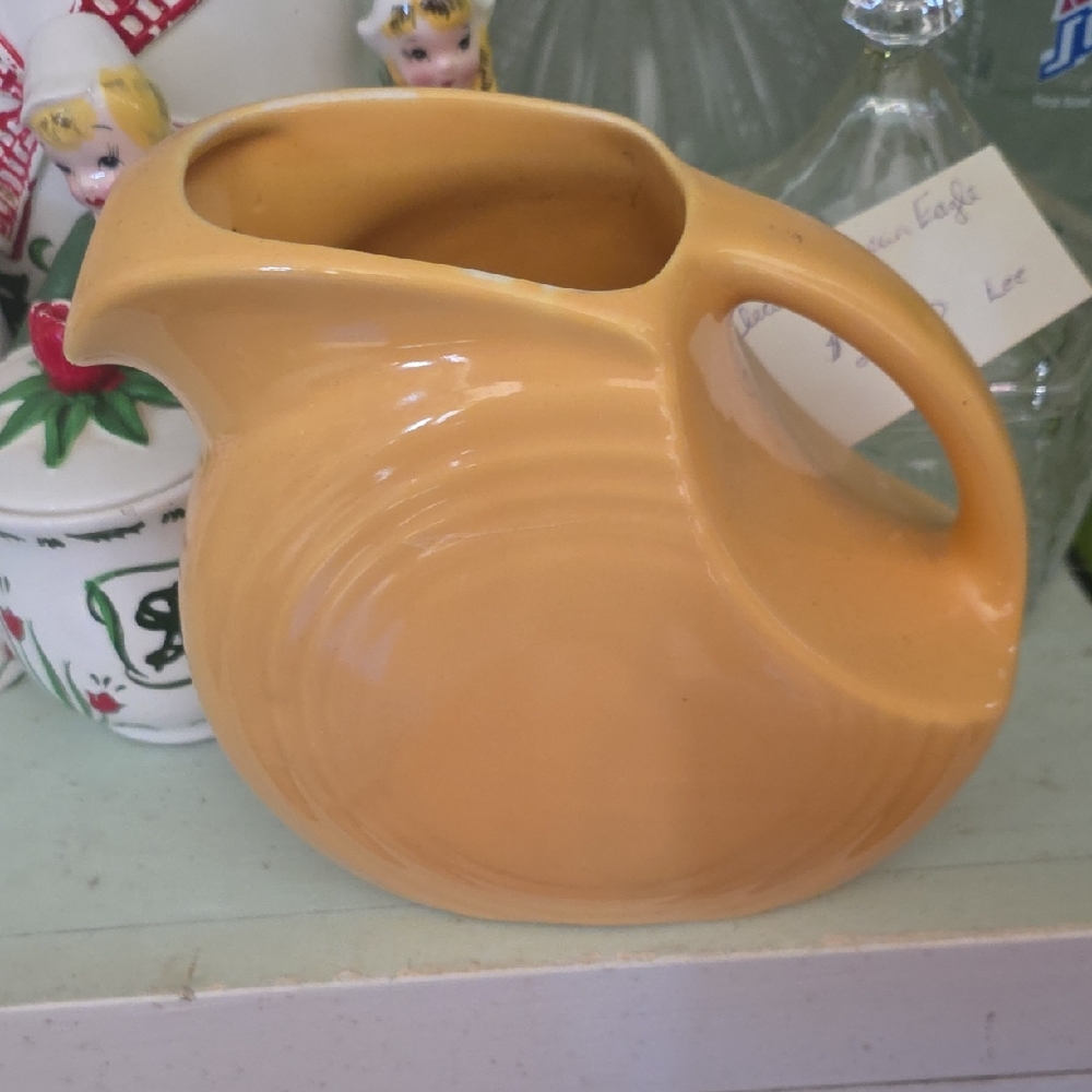 Fiestaware Yellow-Orange Disc Pitcher